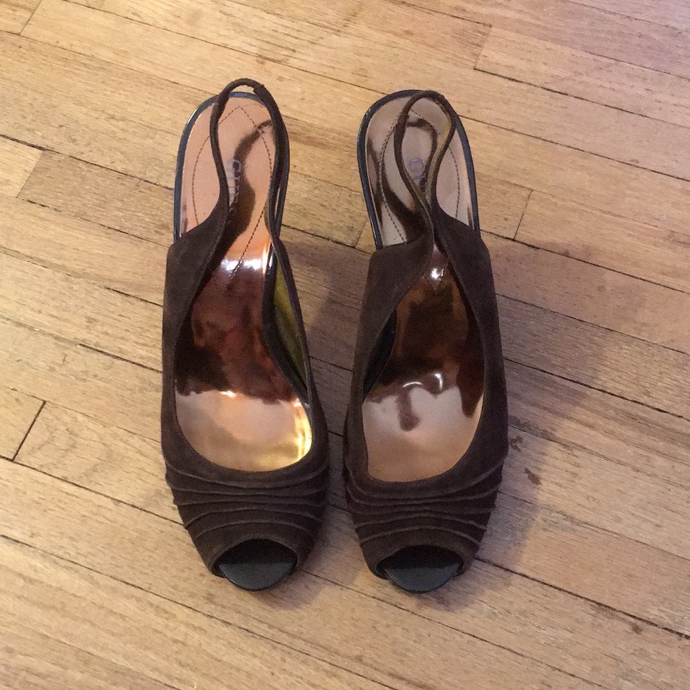 Brown sling back heals.